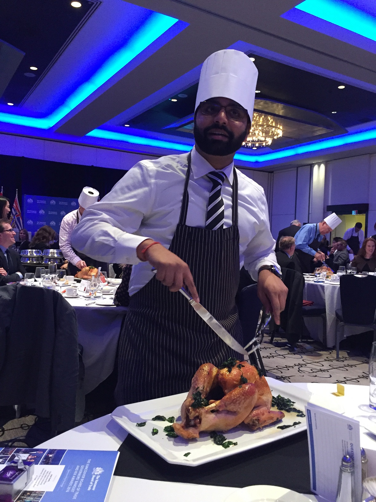 Sasha Ramnarine carves out a Turkey at the Vancouver Board of Trade, Holiday Lunch on December 1